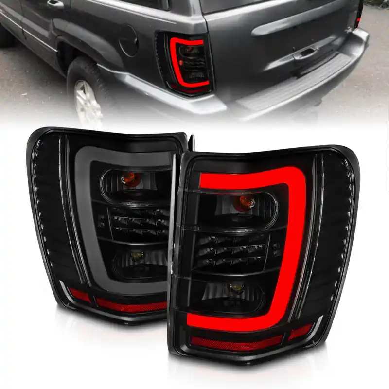 ANZO 1999-2004 Jeep Grand Cherokee LED Tail Lights w/ Light Bar Black Housing Smoke Lens Limited Edition