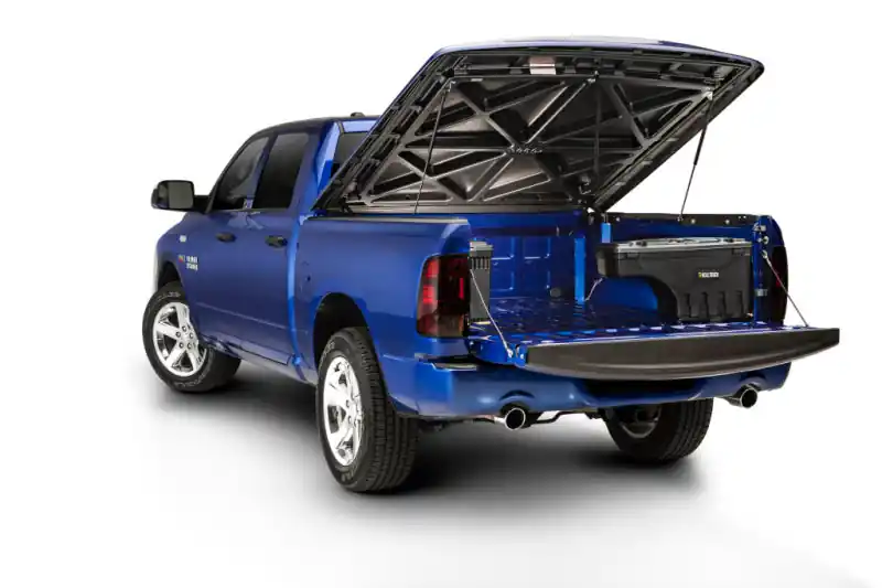 UnderCover 99-16 Ford F-250/F-350 Passengers Side Swing Case - Black Smooth Fresh Stock